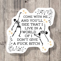 a sticker that says come with me and you'll see that i live in a world of don't give a bitch