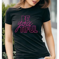 a woman wearing a black t - shirt that says be you tiful