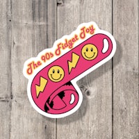 a sticker with a smiley face on it