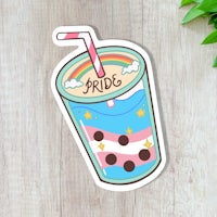 a sticker with a drink and a straw