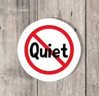 a sticker with the word quiet on it