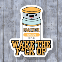 a sticker that says wake the fuck up