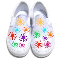 colorful paint splatters on white slip on shoes