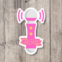 a sticker with a pink microphone on it