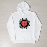 a white hoodie with a red heart on it