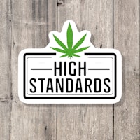 a sticker with the words high standards on it