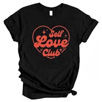 a black t - shirt that says self love club