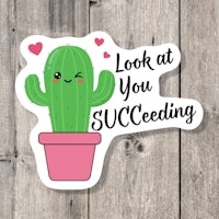 a cactus sticker that says look at you suceeding