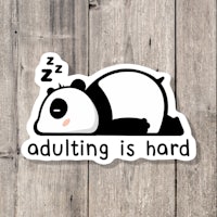 a sticker that says adulting is hard