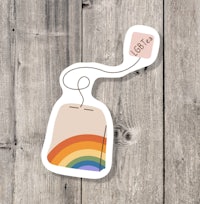 a tea bag sticker with a rainbow on it