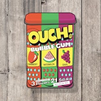ouch bubble gum on a wooden background